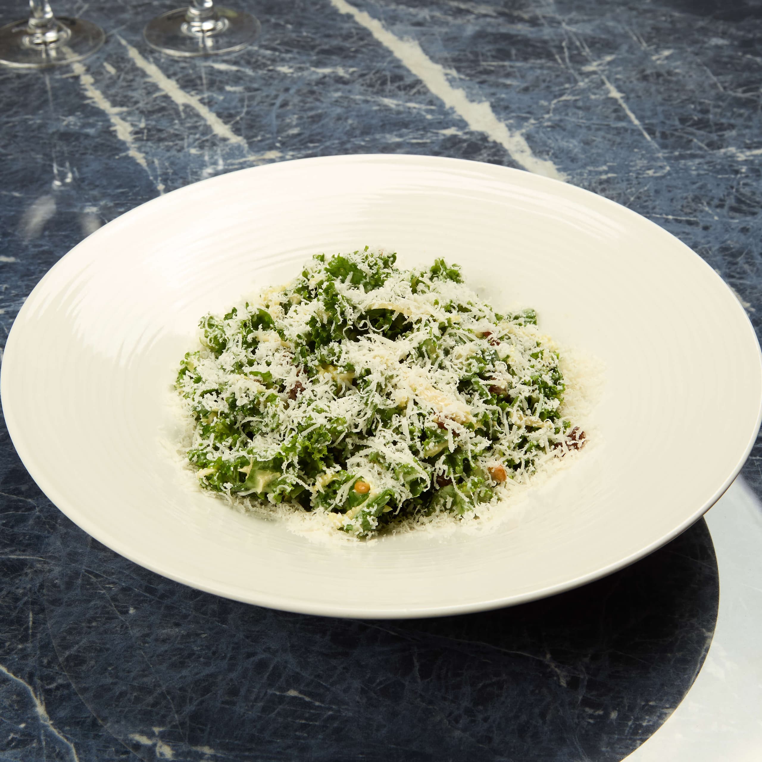 Salade de Chou Frisé, Pignons de Pin, Raisin et Parmesan - Menu item
