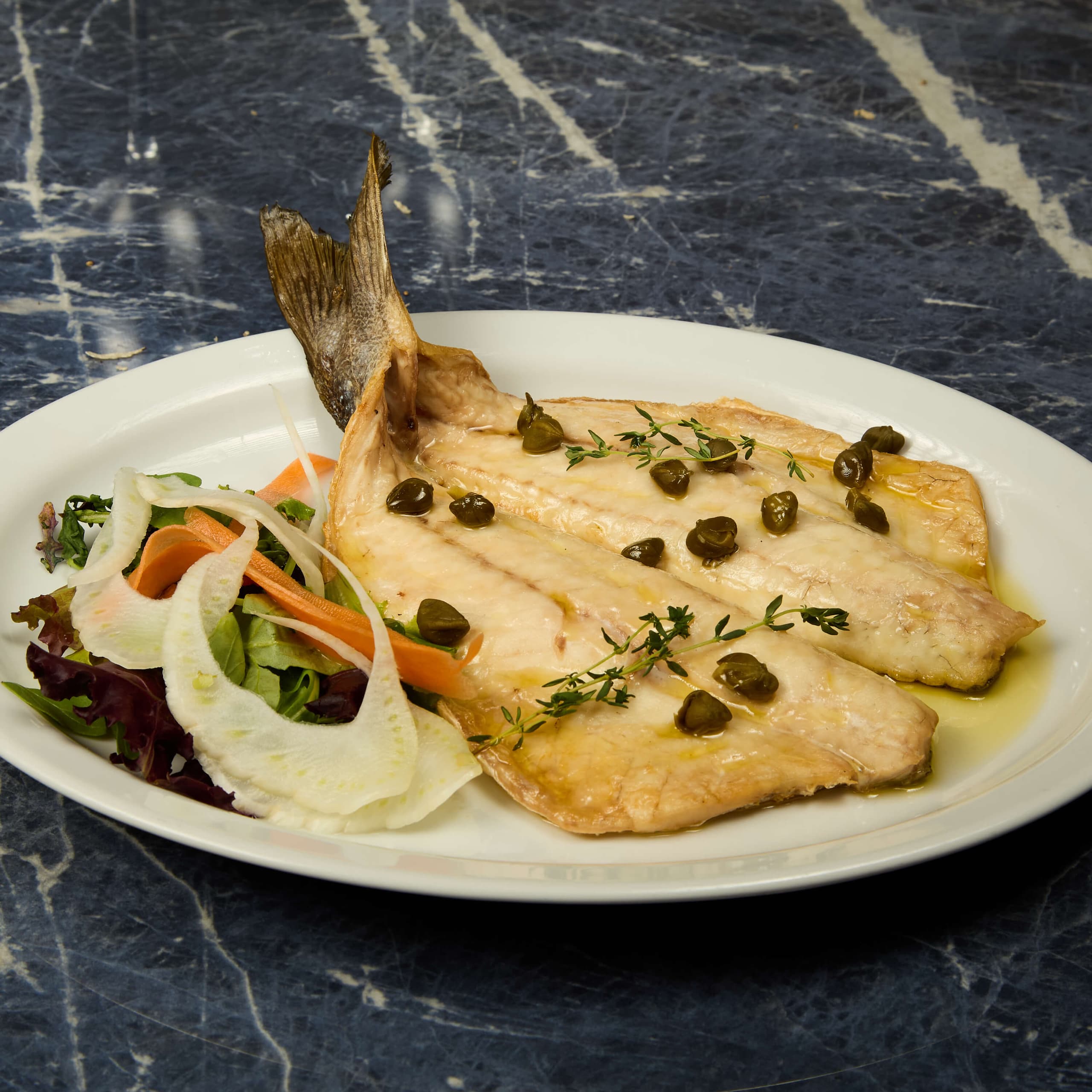 Loup de mer au four & notre sauce - Menu item