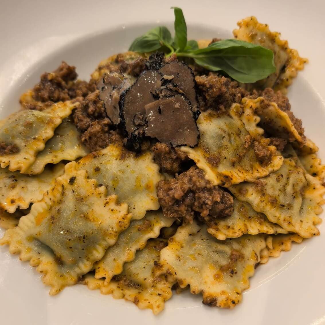 Ravioli with meat bolognese and truffle - Menu item