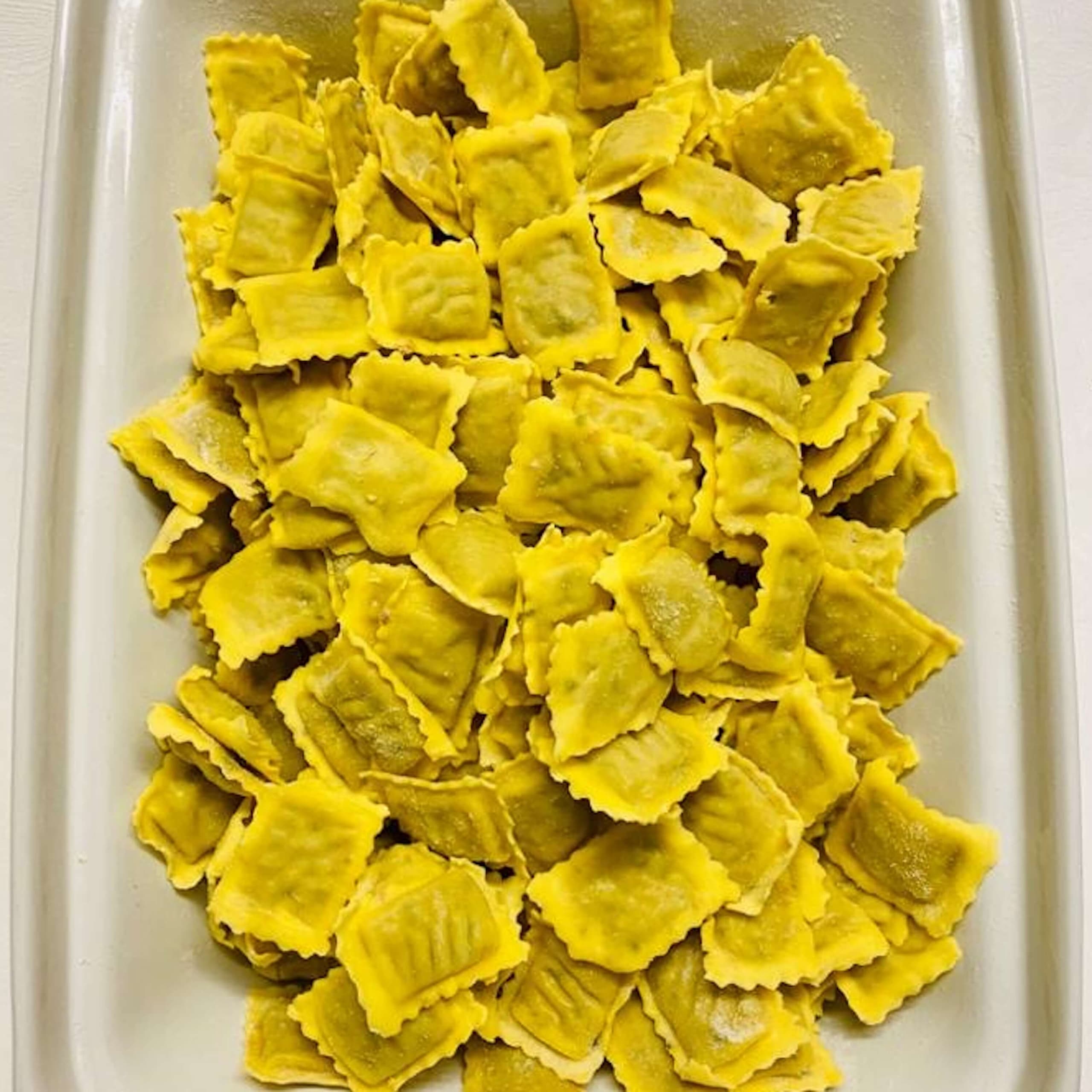 Raviolis courgettes et speck - Menu item