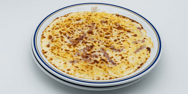 Tagliolini alla Cipriani gratinées au jambon cuit - Menu item