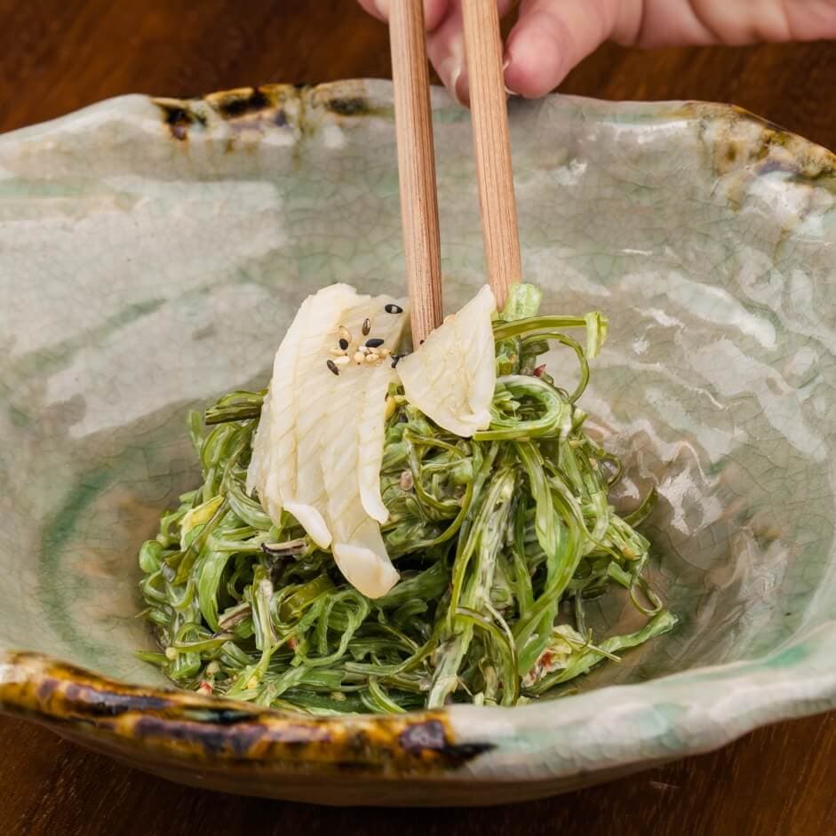 Truffle wakame salad with baby squid - Menu item