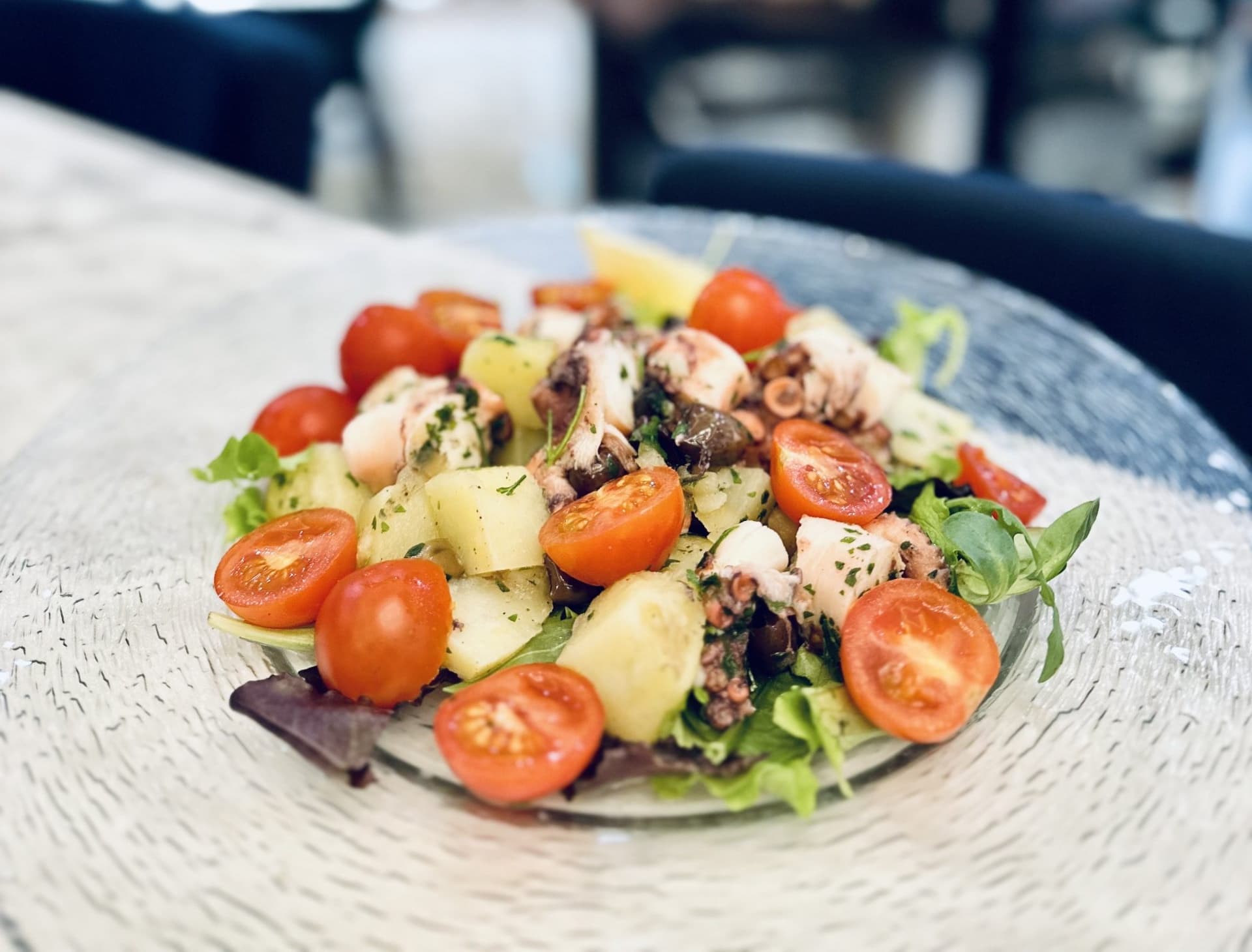 Salade de poulpe et pommes de terre tièdes - Menu item