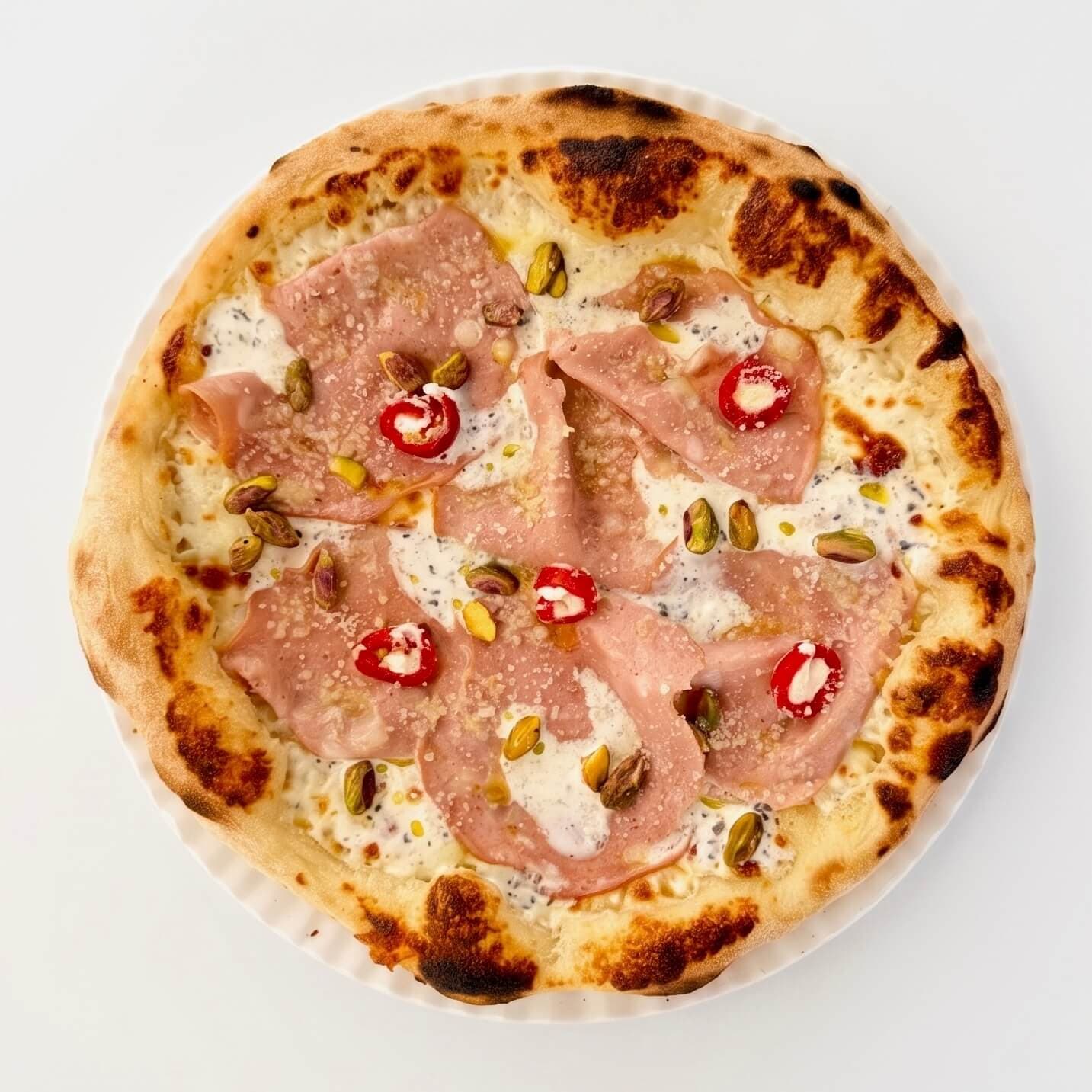 Pizza à la Mortadelle, aux Pistaches, au Miel et à la Sauce à la Truffe - Menu item