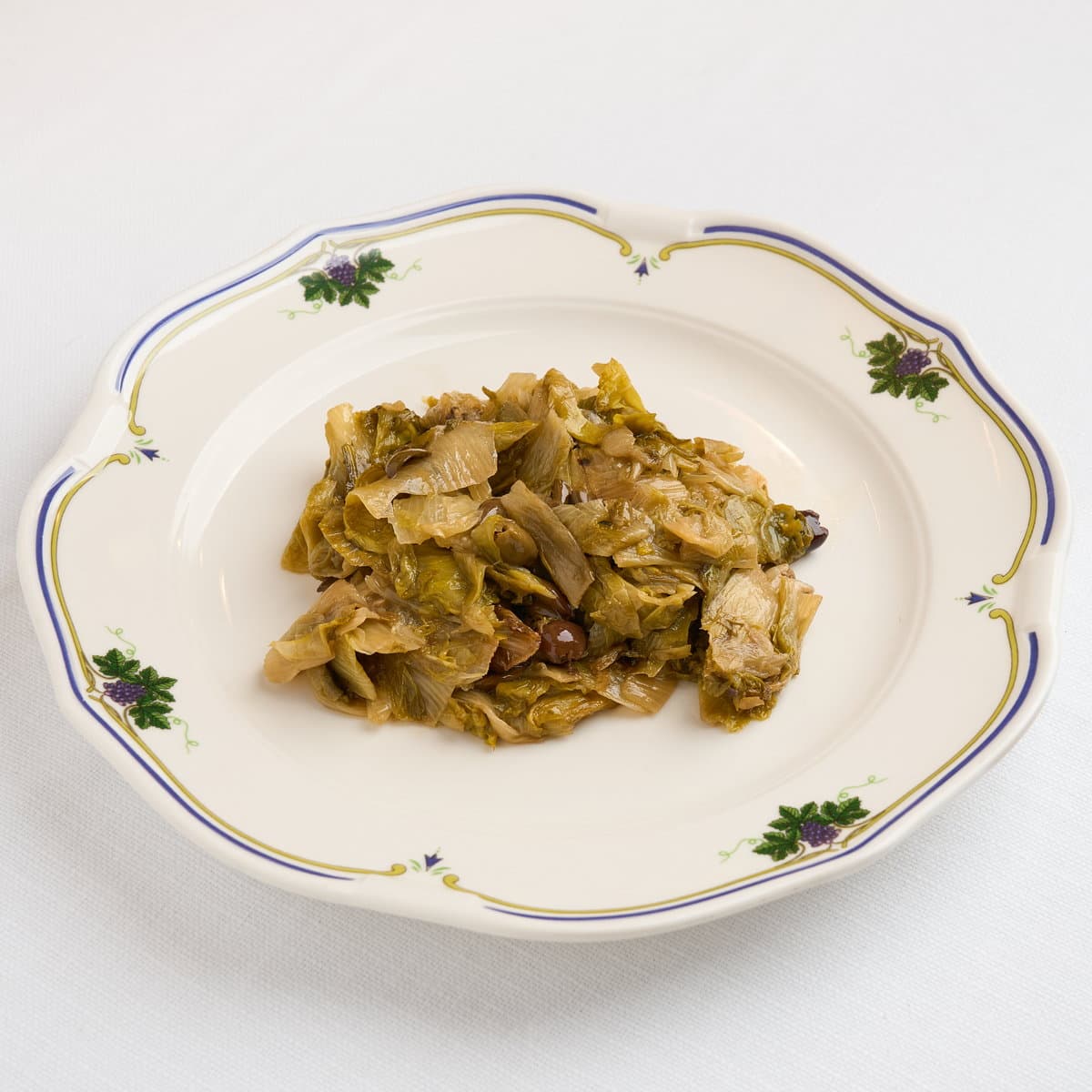 Scarola ripassata in padella con olive nere e acciughe - Menu item