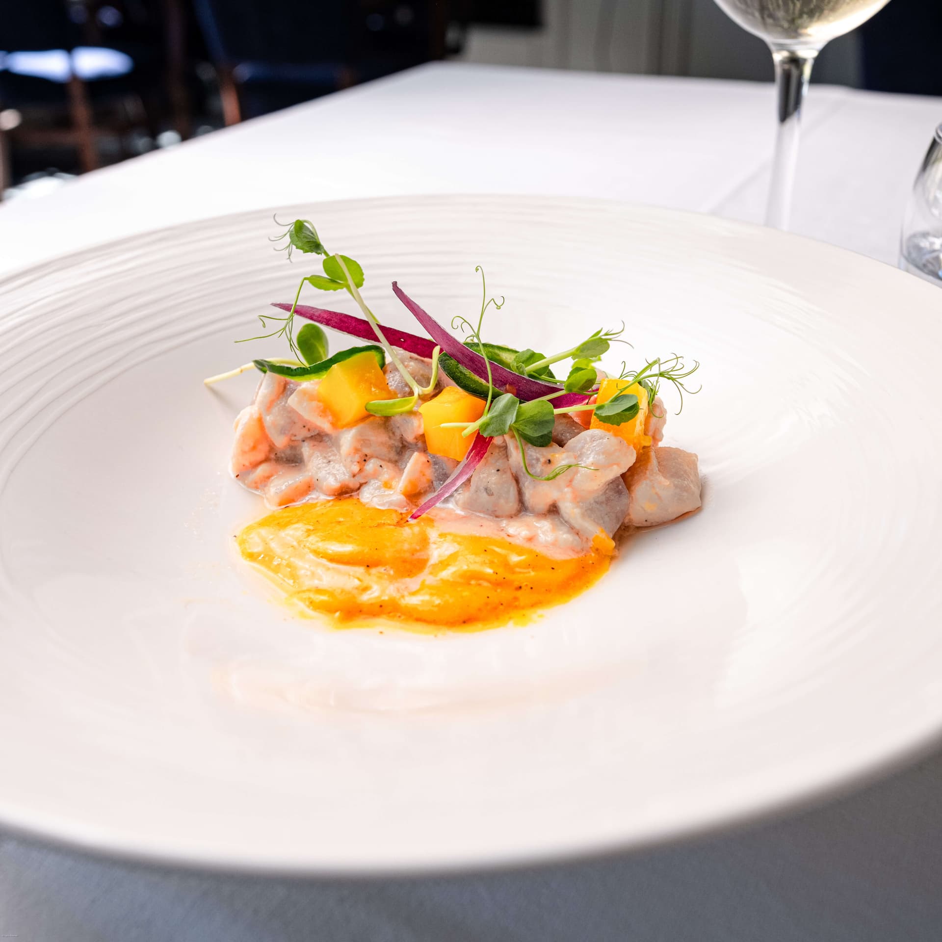 Ceviche de Loup Mango & Leche de Tigre - Menu item